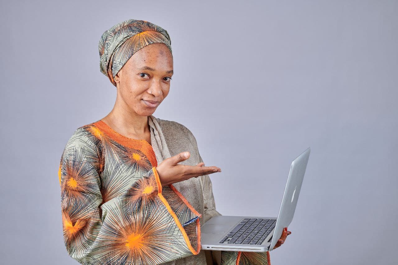 A young entrepreneur celebrating her progress on Lalitah