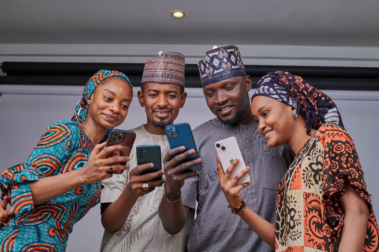 Four people with phone